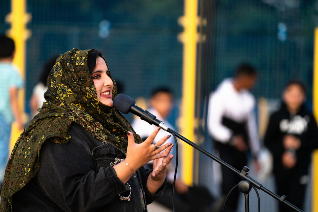 Saleha performs at Poetry in the Park (2019)