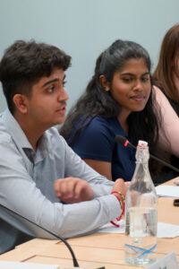 Ved from Slough Youth Parliament addresses the audience.